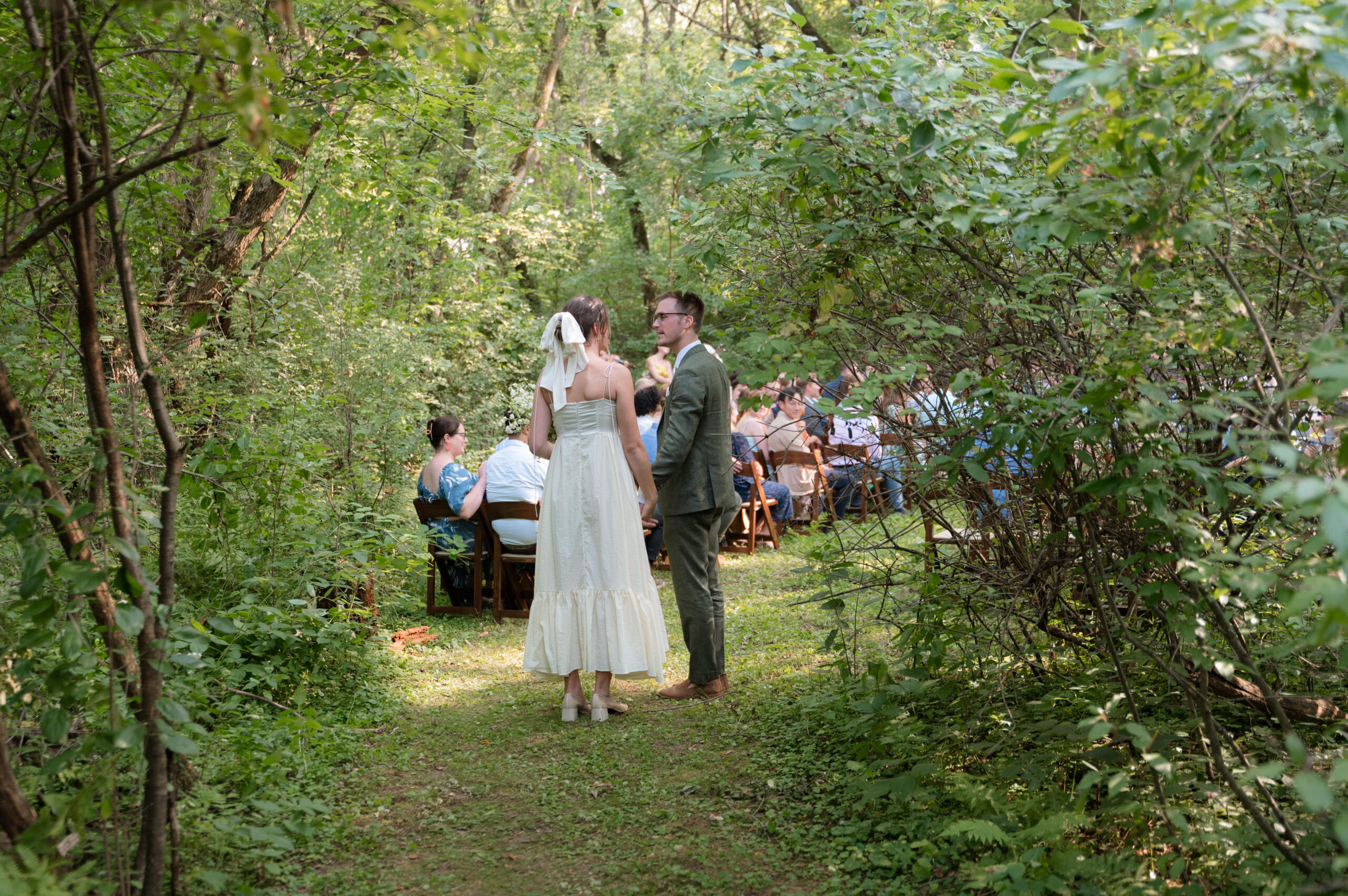 Couple waits for ceremony to start in Intimate Backyard Wedding