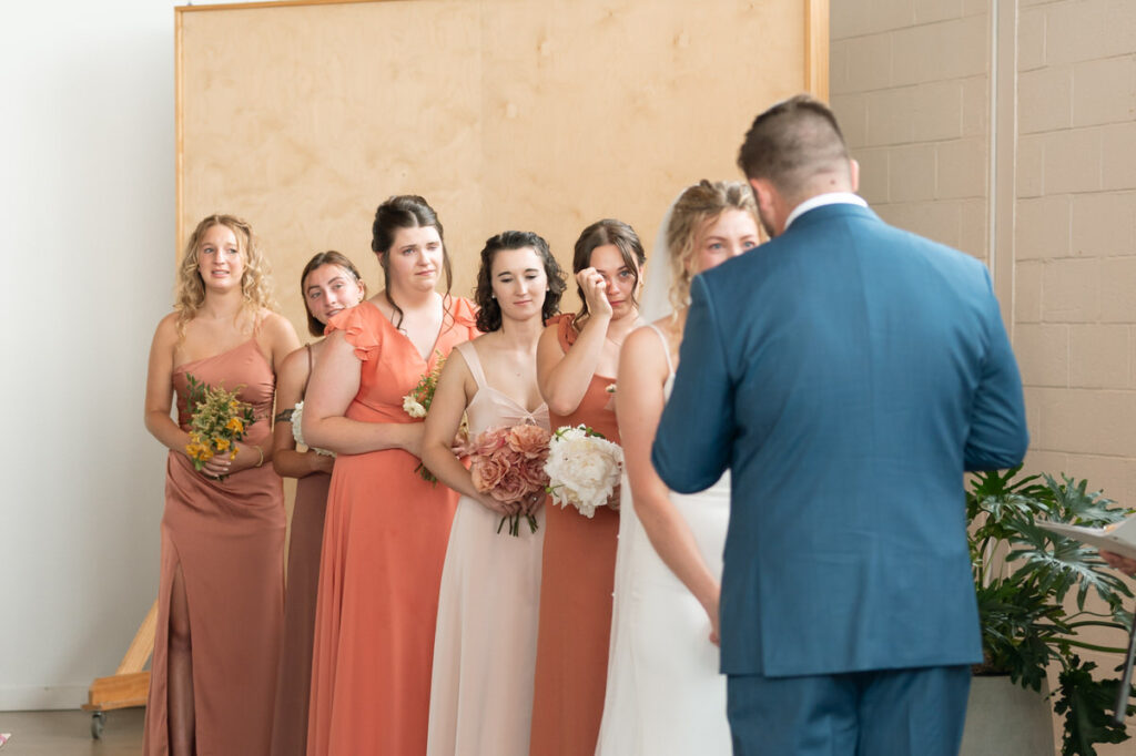 crying bridesmaid at an emotional ceremony